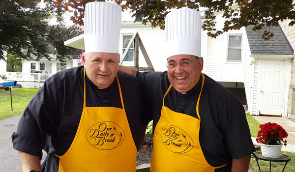 On this month's episode of `Our Daily Bread,` Father Paul D. Seil (left) visits Arcade to cook and chat with longtime friend Father Joseph Gullo.(Daybreak TV Productions)