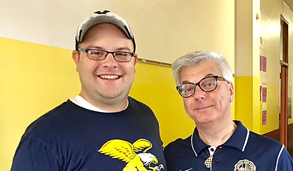 Matt Kwiatkowski (left) and Father Fred Betti, SJ, work as members of One Jesuit Buffalo Alumni. (Courtesy of Father Fred Betti, SJ)
