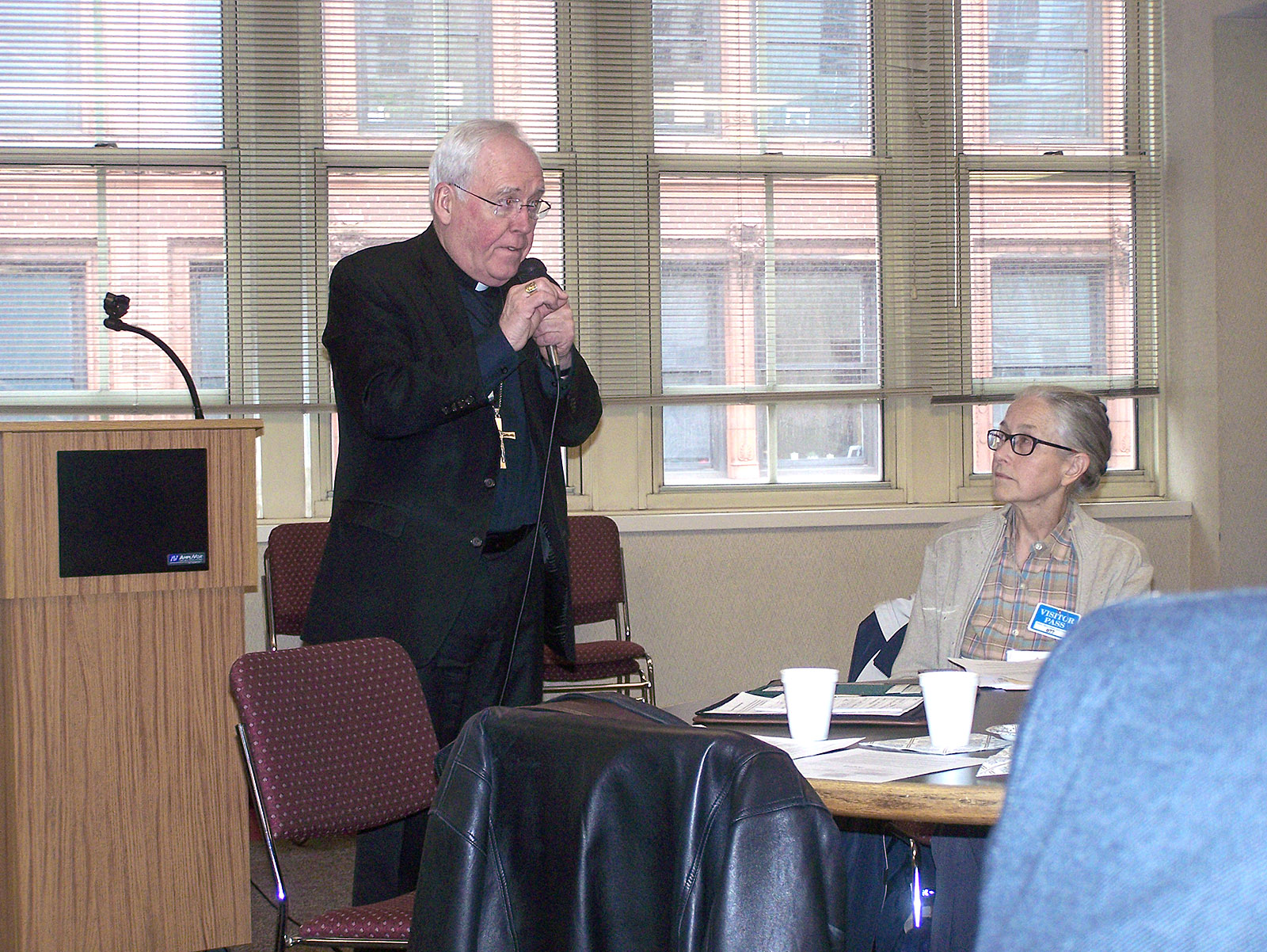 Bishop Richard J. Malone speaks to the members of the Diocesan Pastoral Council during a Dec. 1 meeting at the Catholic Center in downtown Buffalo. The meeting allowed the bishop to address the concerns of the diverse regions of the diocese.  Listening to the bishop is council member Elizabeth Schachtner.
(Patrick J. Buechi/Staff)