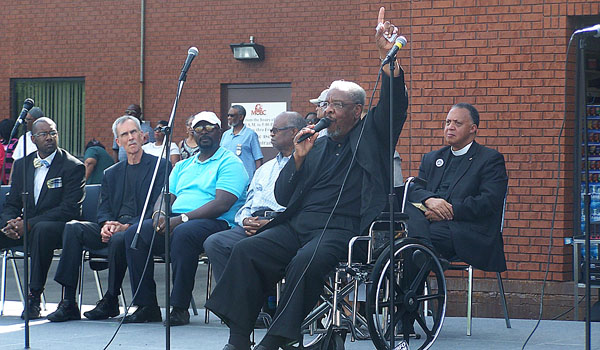 Pastor William Gillison, of Mount Olive Branch Church, calls for prayer to stop the violence at a Citywide Peace Rally. The rally, held at Mount Olive Branch Church in Buffalo, was in response to the shooting of a dozen police officers in Dallas during a Black Lives Matter rally. (Patrick J. Buechi/Staff)