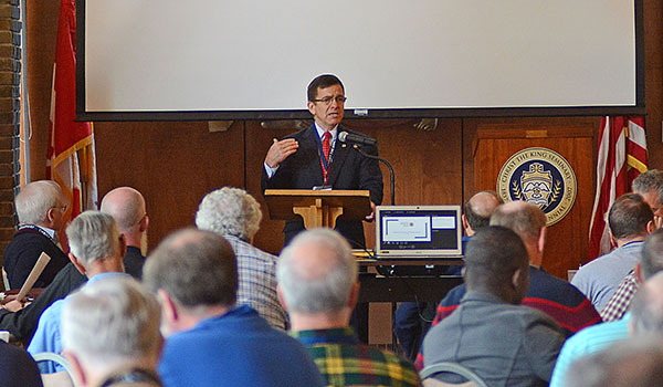 Movement to Restore Trust spokesperson John Hurley speaks to the assembled priests at last week's annual Convocation at Christ the King Seminary. (Dan Cappellazzo/Staff Photographer)