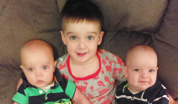 Older brother Jay DeWitt hangs out with his brothers, Theo and Luke. (Courtesy of Katy DeWitt)