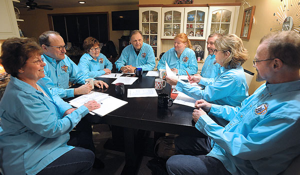 The Western New York Retrouvaille Committee gathers for its monthly meeting. Retrouvaille is an international ministry that offers a lifeline of hope for struggling marriages. (Dan Cappellazzo/Staff Photographer)