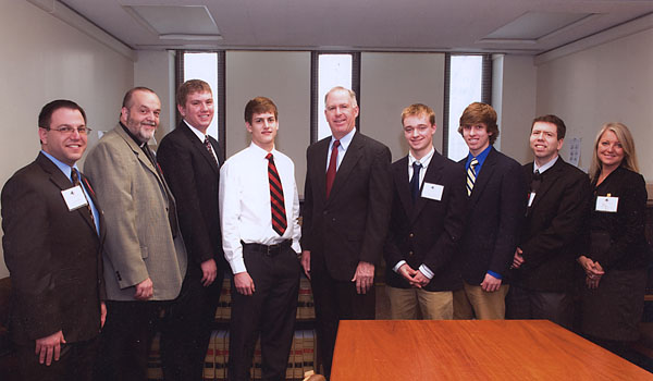 Long an advocate for education tax credits, Christian Riso (left), assistant superintendent for government programs for the Department of Catholic Schools, and others from the Western New York, attend a previous meeting with New York State Senator Michael Ranzenhofer (fifth from right) to discuss Catholic advocacy positions. (Courtesy of Christian Riso)