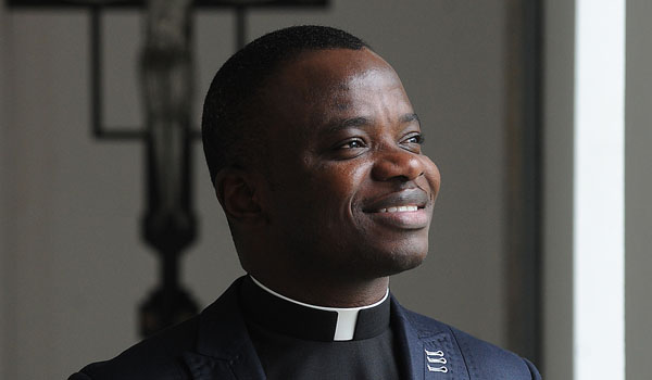 Deacon Robert Agbo prays in the chapel of Christ the King Seminary in East Aurora as he prepares for his ordination at St. Joseph Cathedral in June. (Dan Cappellazzo/Staff Photographer)