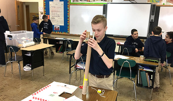 In Invention Convention Academy, Cameron Corcoran creates a device to help solve problems for someone who uses crutches. (Courtesy of St. Mary School)