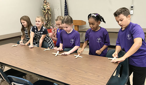 Lainey Babich (from left), Olivia Kaminiski, Sophia Kaminiski, Olivia Cardino, Jahnila Williams and Charles Reisch take part in Kitchen Chemistry at St. John Vianney School. (Courtesy of St. John Vianney School)