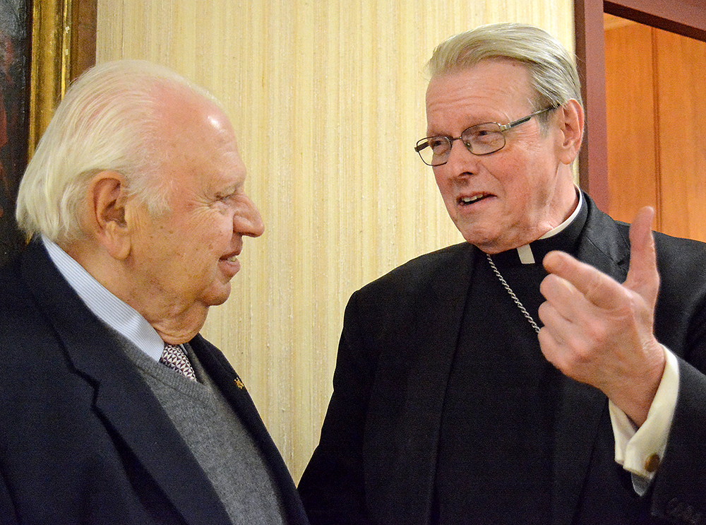 Bishop of Albany Edward Bernard Scharfenberger who has been appointed Apostolic Administrator of the Buffalo Diocese speaks with longtime Catholic supporter and Hon. Salvatore R. Martoche, former New York State Supreme Court Judge in his office at the Catholic Center.