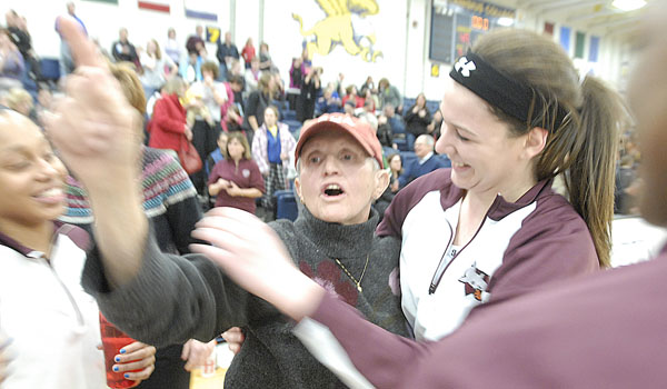 Sister Maria Pares celebrates another Msgr. Martin High School Athletic Association Girls Championship with Sacred Heart Academy in 2012. (Patrick McPartland/Managing Editor)