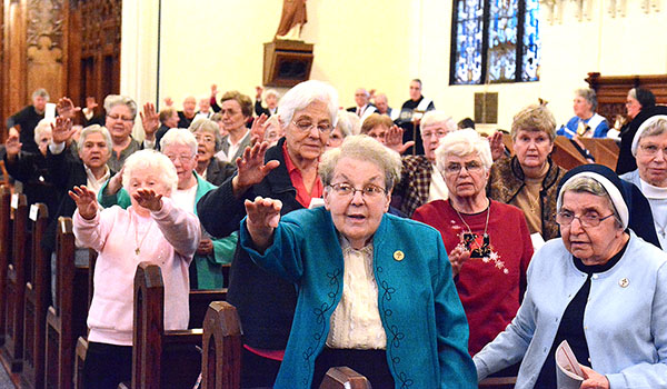 The Sisters of Mercy pray over those gathered for the 160th anniversary of the arrival of the order. (Patrick McPartland/Managing Editor)