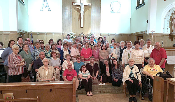 The parish community gathered together after a Marian Consecration Mass held at St. John XXIII Church in West Seneca. 