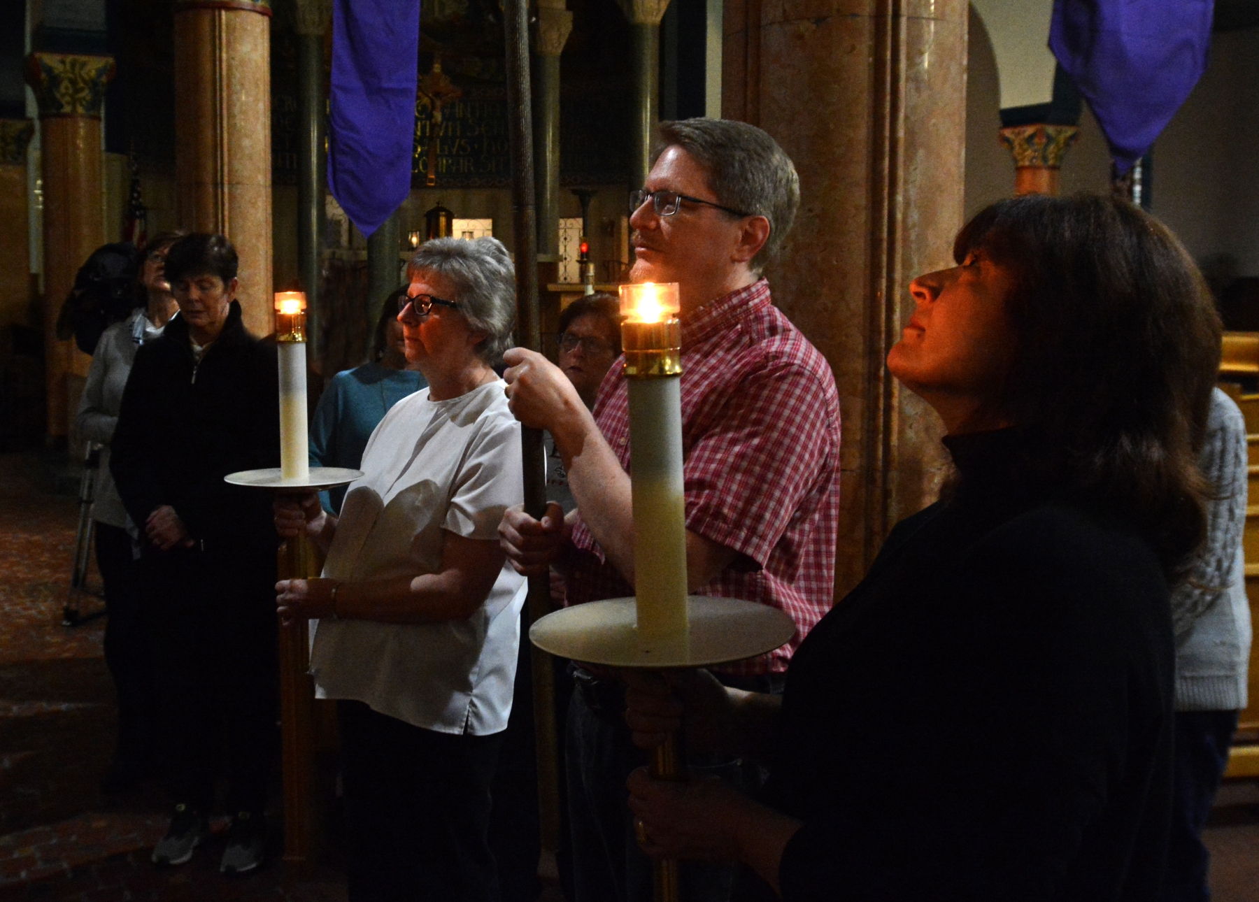  Parishioners walk the Stations of the Cross as Father Bill Quinlivan, of St. Thomas Aquinas Church, South Buffalo, performs his original work  `Stations for a Suffering Church.`
Dan Cappellazzo/Staff photographer