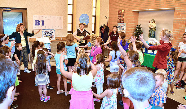 Children sing their opening prayer at Vacation Bible School at St. Vincent de Paul Parish Center, Niagara Falls. (Courtesy of St. Vincent de Paul Parish)
