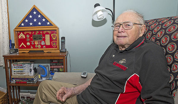 Town of Tonawanda WWII vet Ted Drews in his den, where the former Marine keeps his medals on display. (Dan Cappellazzo/Staff Photographer)