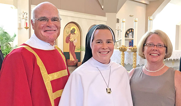 Sister Dominica Hooper, OP, celebrates her professed perpetual vows with her parents, Deacon Mark and Linda Hooper. Sister Dominica joined the Dominican Sisters of Mary, Mother of the Eucharist (Order of Preachers) in Ann Arbor, Mich. (Courtesy of Linda Hooper)