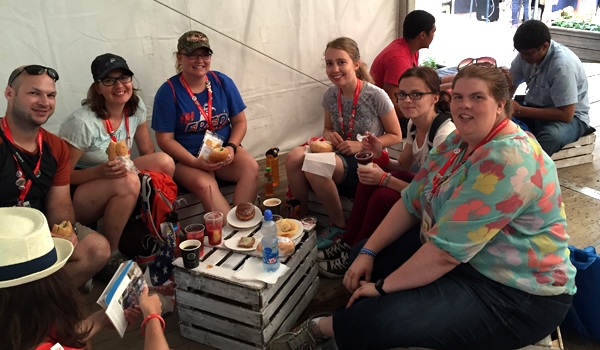 A group of young adults from Western New York stop for lunch outside the Swieccy Dominika, the monastery of Blessed Pier Giorgio Frassati. (Patrick J. Buechi/Staff) 