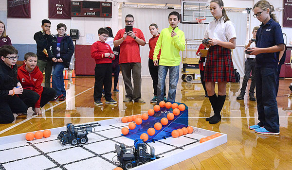 Students from Catholic Academy, Niagara Falls, and Our Lady of the Blessed Sacrament, Buffalo, compete in the robotics competition at this years X-STREAM games and expo hosted by St. Joseph Collegiate Institute. The events highlight the nine courses of the STREAM Academy. 
(Patrick McPartland/Staff Photographer)
