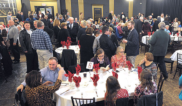 Area families attend the annual Diocese of Buffalo Youth Ministry Awards Banquet at Lucarelli's Banquet Center. Fourteen teen Catholics were honored who genuinely live their lives as young disciples and are actively involved in their parish communities. (Dan Cappellazzo/Staff Photographer)