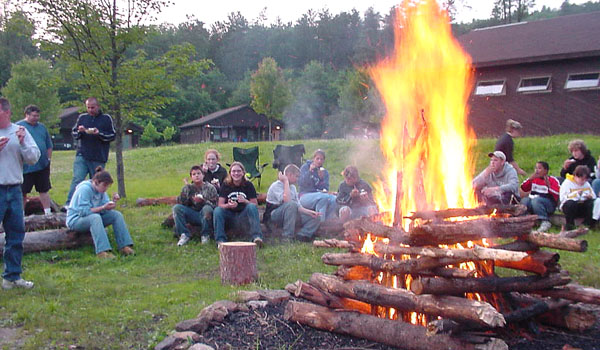 Campers come together around the fire at Camp Turner.