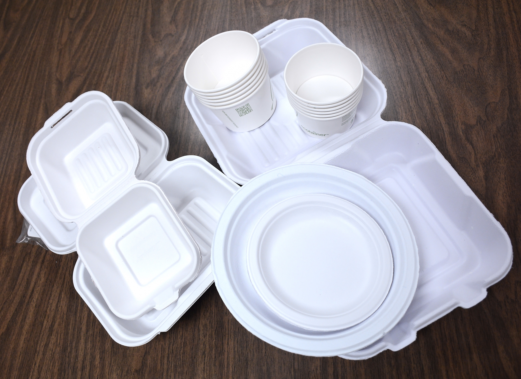 The new eco-friendly paper based to go food containers now used by the Catholic Center cafeteria.
(Dan Cappellazzo/Staff photographer)