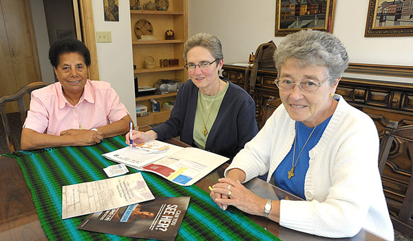 Sister Anne Elisabeth De Vuyst, SSMN (from left), Sister Rosemary Riggie, SSMN, and Sister Caroline Smith, SSMN, are hoping to use what they learned at the conference on human trafficking to inform others on the issue. (Patrick McPartland/Staff Photographer)