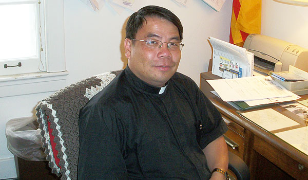 Father Joseph Nguyen, who faced religious persecution in his native land, now helps serve the Vietnamese population in the diocese.