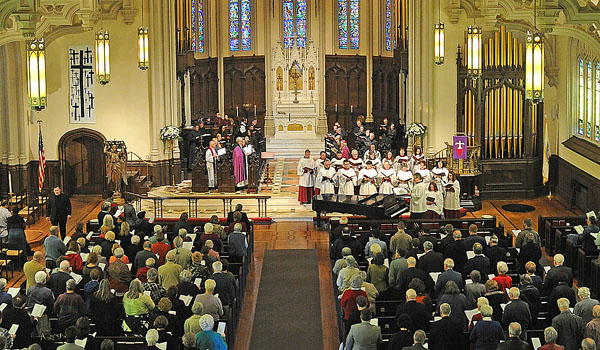 Catholic and Lutheran Choirs sing during a Joint Vespers service on Sunday, March 26, at Holy Trinity Lutheran Church, 1080 Main St., Buffalo to mark the observance of the 500th anniversary of Martin Luther's posting of the 95 Theses in Wittenberg, Germany, an event that marked the beginning of the Protestant Reformation. The Roman Catholic Diocese of Buffalo and the Upstate New York Synod of the Evangelical Lutheran Church in America jointly held the event. (Dan Cappellazzo/Staff Photographer)
