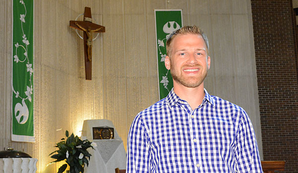 Adam Pasternak serves as director of evangelization at St. Amelia Parish in Tonawanda.
(Patrick McPartland/Staff Photographer)