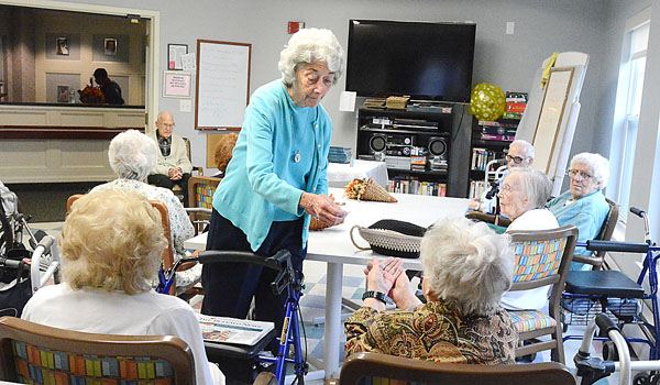 Sister Marianne Ferguson, OSF, devotes her time to serving Catholic residents living in non-denominational homes for the elderly. (Patrick McPartland/Staff Photographer)