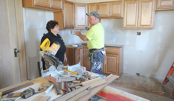 Cheryl Calire, director of Pro-Life Activities, and Alan Stahl of Mader Construction talk about the progress on Mother Teresa House in Buffalo.
(Patrick McPartland/Staff Photographer)