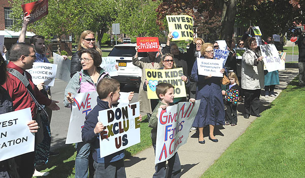 Educators, parents and students gather at New York State Assembly member Sean Ryan's office to call for his vote on education tax credits.
(Patrick McPartland/Staff Photographer)