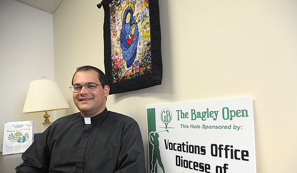 Father Andrew Lauricella looks to provide guidance, as well as raise awareness of the call to the priesthood. (Patrick McPartland/Staff Photographer)