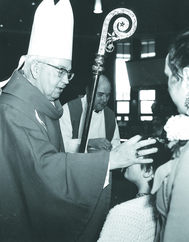 Bishop McLaughlin during the Rite of Confirmation April 20, 1978.