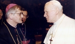 Bishop Edward Grosz meets with Pope John Paul II.