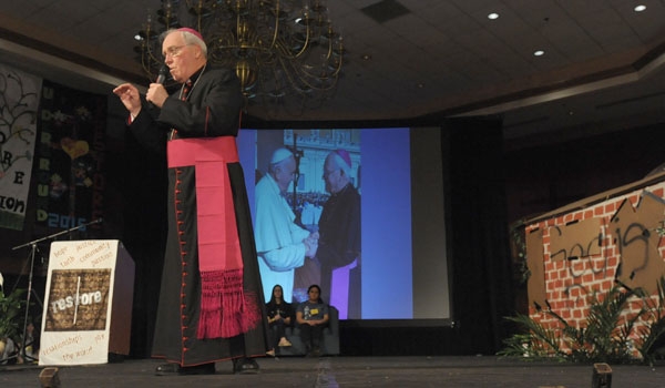 Bishop Richard J. Malone welcomes those attending the 63rd Diocesan Youth Convention at Adam's Mark Hotel.