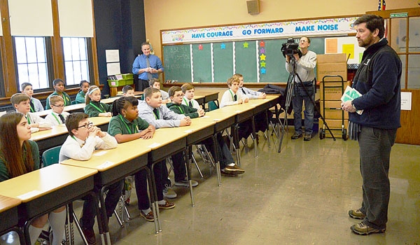 Erie County Executive Mark Poloncarz visits with St. Benedict School's sixth and seventh-grade students, to thank them for home-made thank you cards he received from the students regarding his November storm efforts.
(Courtesy of St. Benedict School)