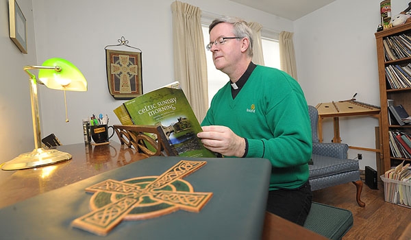 Father Bill Quinlivan has been named Irishman of the Year by the Knight of Columbus.
(Patrick McPartland/Staff Photographer)