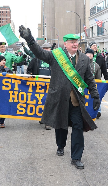 Rick Kobis leads the marchers from St. Teresa Holy Name at the annual St. Patrick's Day Parade up Delaware Avenue in the City of Buffalo. St. Teresa Holy Name is celebrating its 105 year.
(Patrick McPartland/Staff Photographer)