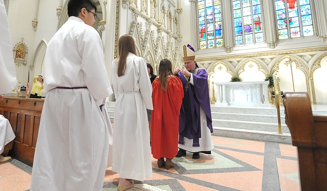 Altar servers from around the Diocese of Buffalo receive their medals from Bishop Richard J. Malone at the annual Altar Server Awards at St. Joseph Cathedral.
(Patrick McPartland/Staff Photographer)