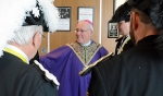 Bishop Malone greets the Knigh…