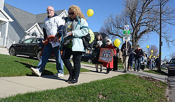 Patrick McPartland - Respect Life Marchers walk silently up Parker Avenue in Buffalo from St. Rose of Lima Parish to an abortion clinic on Main Street.