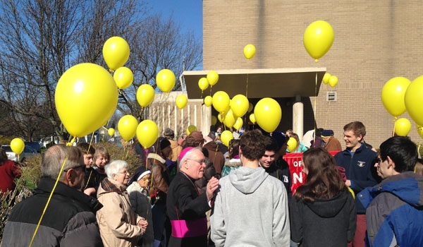 Patrick McPartland - Yellow balloons dot the area around St. Rose of Lima Parish at the conclusion of the Rosary Novena for Life Mass.