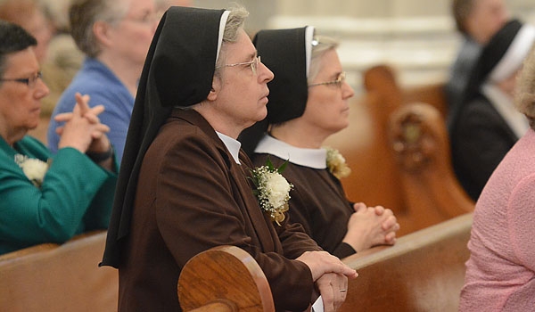 Jubilarians Sister Mary Rose Szymanski CSSF (left to right) and Sister Mary Jessica Terek, CSSF kneel in prayer at the conclusion of the Jubilee 2015 and the Year of Consecrated Life at St. Joseph Cathedral.
(Patrick McPartland/Staff Photographer)
