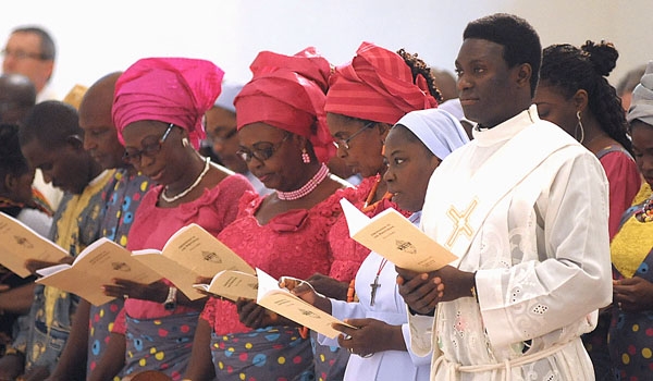 Friends and family or ordini Daniel Ogbeifun traveled from Nigeria to witness his ordination to the priesthood. The ceremony took place at St. Joseph Cathedral.
(Patrick McPartland/Staff Photographer)