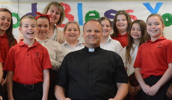 A native of Poland, Father Lukasz Kopola now serves as parochial vicar at St. John Vianney Church in Orchard Park.