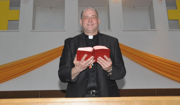 Father John Adams used to be a secular psychologist, but is now serving as parochial vicar at SS. Peter and Paul Parish in Hamburg.