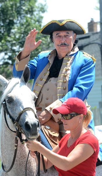 General Pulaski, portrayed by Stanley Pulaski rides again down Harlem Road as part of the Pulaski Day Parade in Cheektowaga.