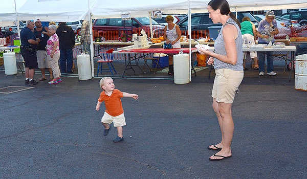  Owen Chase, 1, dances with his mom, Colleen at the Our Lady of Charity Summerfest.
(Patrick McPartland/Staff Photographer)