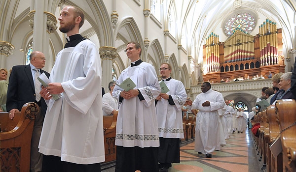 Current seminarians process into St. Joseph Cathedral at the opening of ceremonies for ordination to the diaconate.