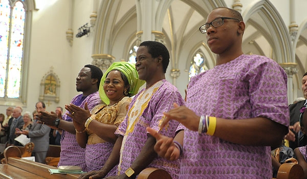 Members of Venatius Agbasiere's family traveled from Africa to witness his ordination to the transitional diaconate.
(Patrick McPartland/Staff Photographer)